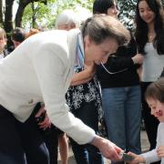 Princess Anne handed gifts to children during a visit to Swindon on the coronation weekend