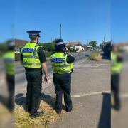 Officers carrying out speed checks in Hook
