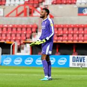 Former Swindon Town goalkeeper Lawrence Vigouroux in action