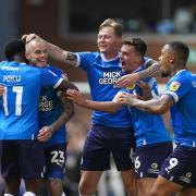 Peterborough United's Joe Ward (second left) celebrates scoring their side's second goal of the game during the League One play-off semi-final against Sheffield Wednesday