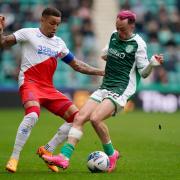 Hibernian’s Harry McKirdy (right) and Rangers’ James Tavernier battle for the ball during the Scottish Premiership match at Easter Road