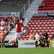 Former Swindon Town loanee Alex Gilbert tries to cross during one of eight League Two outings at the start of the 2021/22 campaign
