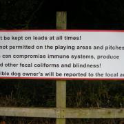 A sign at the Nalgo sports ground warning dog walkers