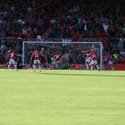 Wrexham's Elliot Lee smashes home the hosts' equaliser in the 96th minute