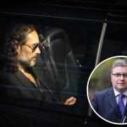 Russell Brand and Sir Robert Buckland (inset)