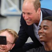 Prince William posing for a selfie during his visit to Swindon charity BEST - Be A Better You