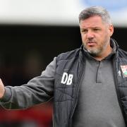 Dean Brennan is staying at Barnet despite an approach from Swindon Town