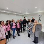 Members of Mums on a Mission, Andy from Danfo the contractor and representatives from Swindon Borough Council in a new Changing Places facility in Swindon's parks