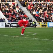 Swindon again denied by late goal