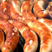 Sausages on a barbecue.