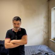 Dennis McNamee is unhappy with the state of his supported living accommodation, which is riddled with mould and leaks