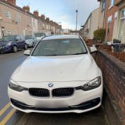 BMW parked on the pavement on Whiteman Street, Swindon