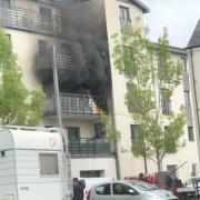 Fire breaks out at a block of flats in Swindon