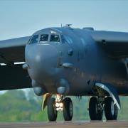 A B-52 bomber lands in RAF Fairford with more expected to arrive in the coming days