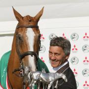 Andrew Nicholson celebrates his triumph at Badminton last year with horse Nereo (Picture: PHIL JOHNSON/ EDP PHOTO)
