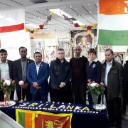 Community leaders at the Hindu temple in Cheney Manor after the ceremony with MP Robert Buckland