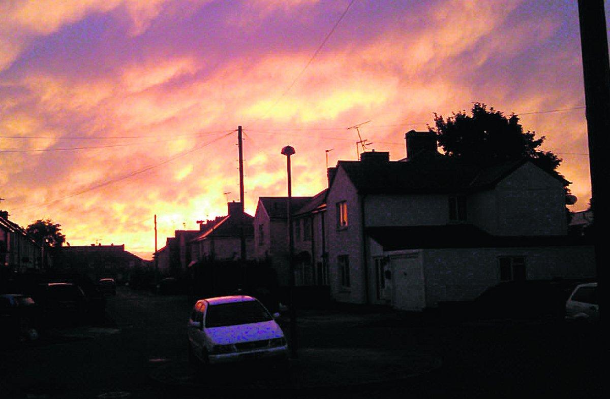 Swiindon Advertiser readers photographs Sunrise over Pinehurst 
Picture: REG ROBBINS