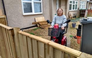 Jayne Kustra cannot get her scooter through the new gate at her council house