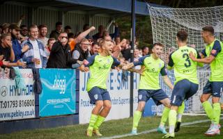 Merthyr Town celebrate one of three goals against Swindon Supermarine on Monday