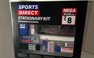 Behind the sticker shows the same error on Sports Direct's stationery kits.