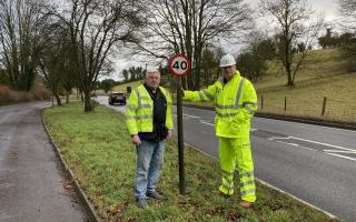 National Highways’ A303 route manager Chris Hilldrup (right) surveys the new signage with Chicklade resident John Young.