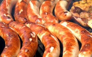 Sausages on a barbecue.