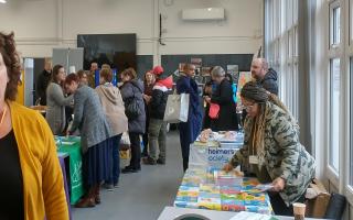 Stalls and residents in the community centre