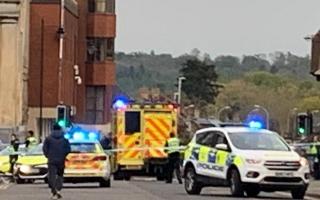 Emergency services attend Wood Street after incident closes road