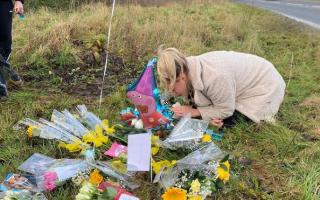 Abby Lever at the roadside of where her husband Ewen was fatally killed in a crash