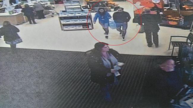 A CCTV image of Alexandru Ciurez and Denisa-Georgiana Mitu (circled) at Waitrose in Mill Lane, Swindon on Tuesday.