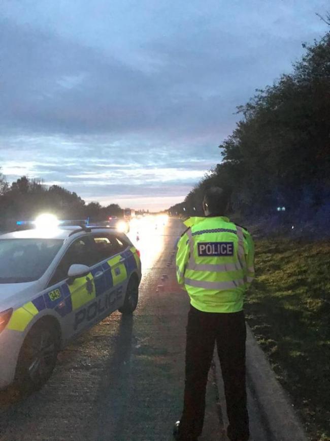 Police at the scene of the A419 lane closure.